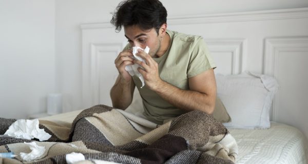 man-suffering-from-allergies-full-shot